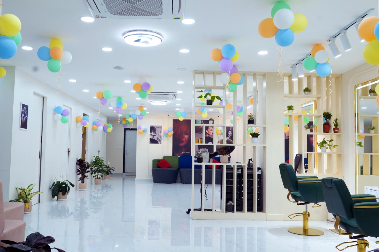 Full salon floor — white interior with partitions and emerald chairs
