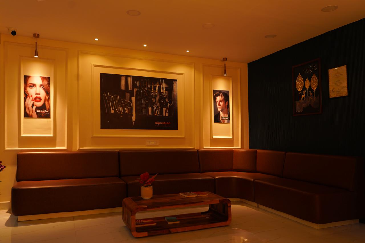 Cozy lounge corner with framed art and warm lighting