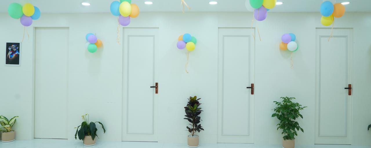 White panelled treatment-room doors